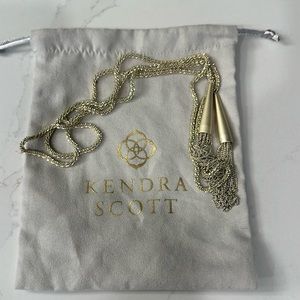 Kendra Scott gold tassel necklace.